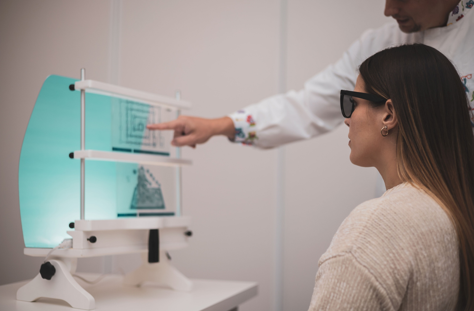 Young woman undergoing a vision therapy session.